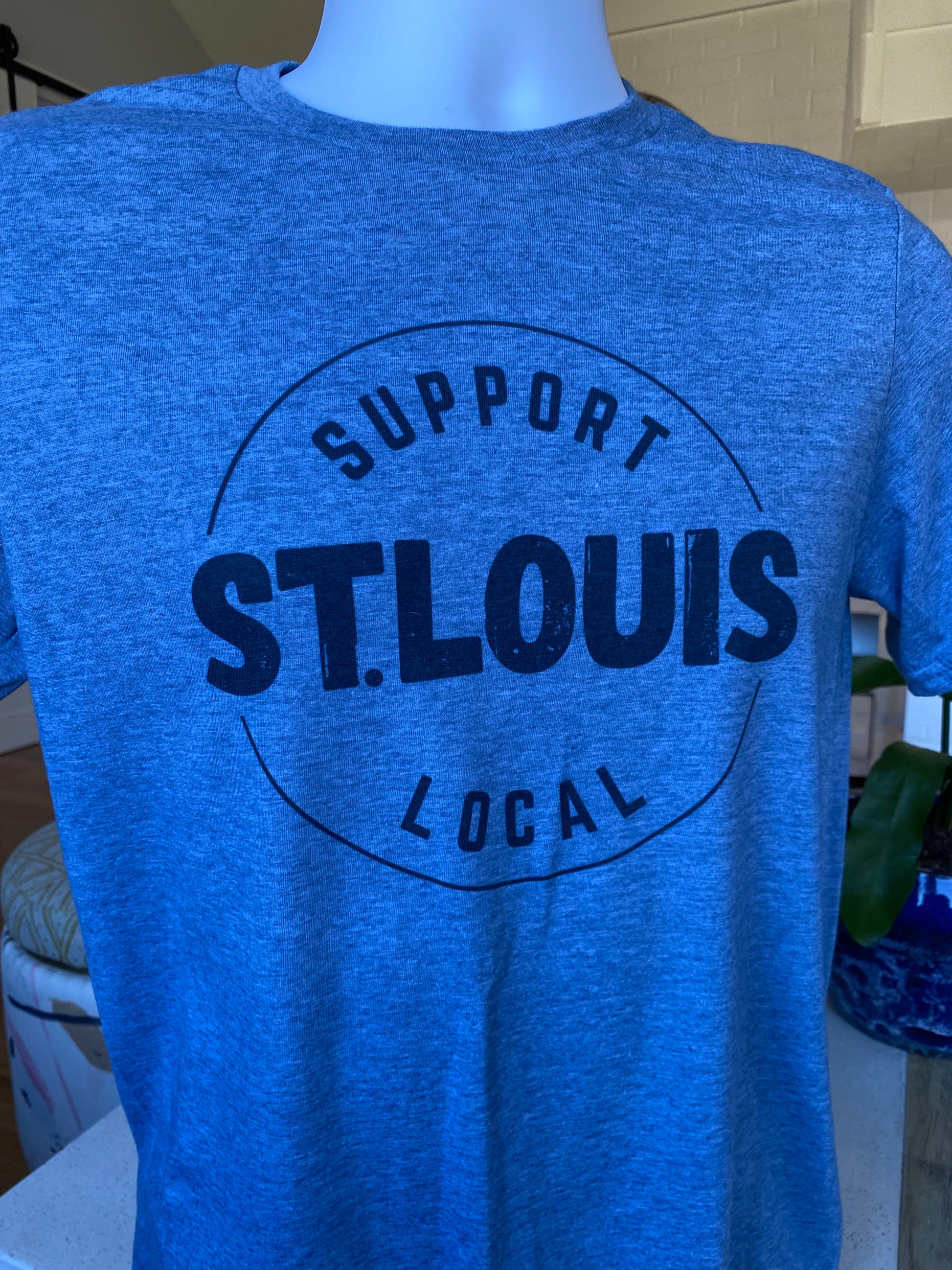 St. Louis T-Shirt (blue) encouraging the community in St. Louis, Missouri to Support Local St. Louis businesses in city neighborhoods through apparel.