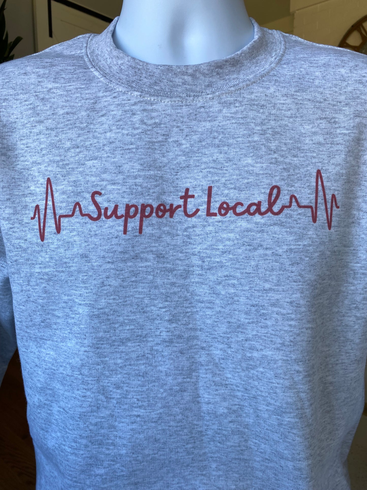 Support Local Sweatshirt to encourage the community to Support Local small businesses, which are the heartbeat of the city.